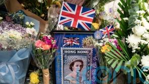 Public grief over Queen ‘doubles as dissent’ in Hong Kong
