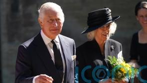Crowds welcome Charles and Camilla to Wales amid bright sunshine
