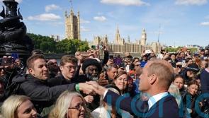 Mourners squeal, cheer and break down in tears on meeting Charles and William