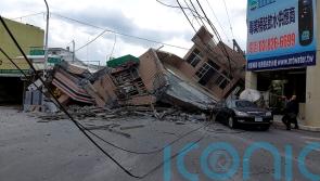Building collapses and landslide traps tourists on mountain after Taiwan quake