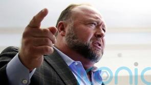 Alex Jones makes appearance outside Sandy Hook damages trial