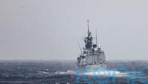 China dials down Taiwan rhetoric as US and Canada transit strait