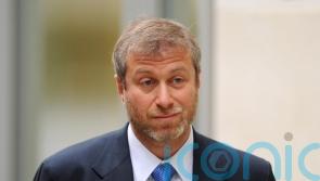 Briton freed from captivity says Roman Abramovich welcomed them onto plane