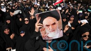 Counter-protests held in Iran after days of unrest over young woman’s death