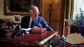 King Charles pictured with red box for the first time