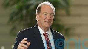 World Bank boss says he will not quit over climate change remarks