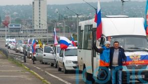 Russian forces strike Ukrainian cities while votes takes place in occupied areas
