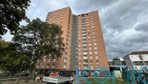 Man dies ‘after climbing out of window to escape tower block fire’