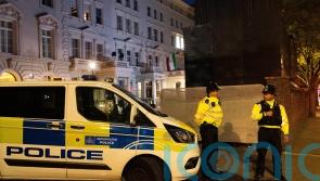 Protesters clash with police outside Iranian embassy in London