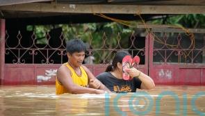 Powerful typhoon leaves five rescuers dead in north Philippines
