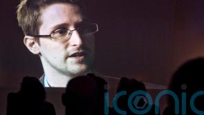 Vladimir Putin grants Russian citizenship to NSA whistleblower Edward Snowden