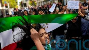 Iranian legislator condemns protests over death of woman detained by police