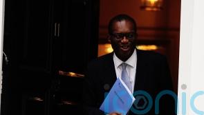 Kwarteng seeks to calm City nerves after IMF urges a change of course