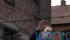 Schwarzenegger visits Auschwitz to deliver message against hatred