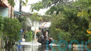 Tropical rains flood parts of Thailand as 5,000 seek shelter