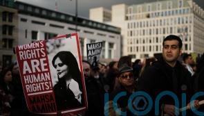 Iran says it has arrested nine foreigners over anti-hijab protests