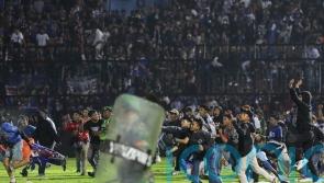 At least 125 people reportedly dead after stampede at Indonesian football match
