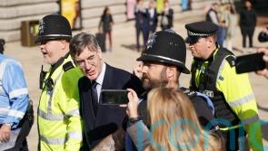 Rees-Mogg booed by protesters in Birmingham as Tory conference kicks off
