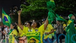 Bolsonaro and Lula appear headed for run-off in Brazil’s polarised election race