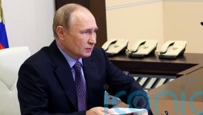 Belarus leader gives Putin a tractor voucher on 70th birthday