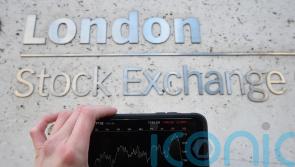 Sterling falls against a stronger dollar as FTSE 100 slips into the red