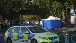 Man who died after being shot by armed officers at police station is named