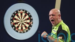 Michael van Gerwen holds off Nathan Aspinall comeback to win World Grand Prix