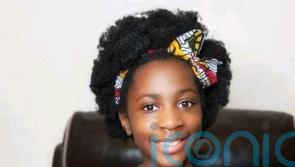 Tiana, 8, hopes book about her afro hair will inspire others to love themselves