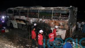 Pakistan bus fire kills at least 18 flood survivors