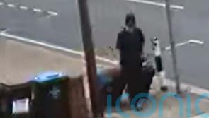 Murder accused walked streets with bulky suitcase for two hours, court told