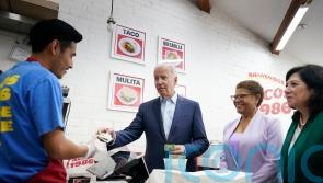 Biden pushes lower prescription drug costs in mid-term campaign