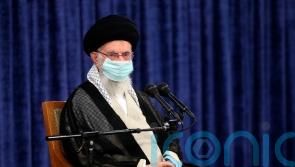 Blaze and shots reported at jail in Iran’s capital amid protests