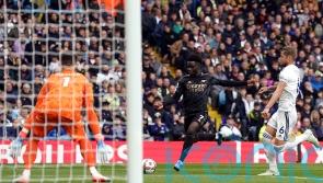 Bukayo Saka fires Arsenal to win as league leaders survive late scare at Leeds