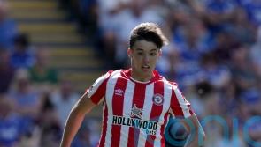 Aaron Hickey to miss Brentford’s clash with Chelsea due to ankle injury
