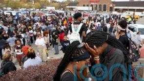 Two killed in shooting at St Louis high school and gunman dead