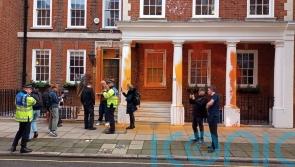 Just Stop Oil protesters spray paint HQ of climate sceptic think tank in London