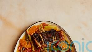 Ottolenghi Test Kitchen’s blackened chicken with caramel and clementine dressing recipe