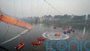 Suspension bridge collapse kills at least 133 in India