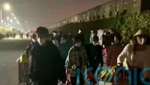 Workers walk out of China iPhone factory amid Covid lockdowns