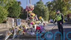 Teenage pair deny murdering boy outside school gates