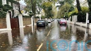 Heavy downpours lead to flooding and transport disruption