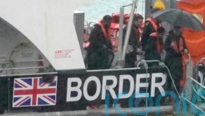 Embattled Home Secretary visits migrant facilities in bid to grip crisis