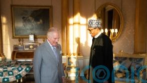 Smiling King carries on with audience at Palace after egg throwing incident