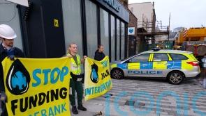 Two arrested after bank windows smashed in climate protest
