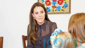 Kate comforts weeping mother at centre for families fleeing Ukraine war
