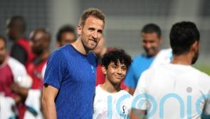 Today at the World Cup: England squad meets migrant workers