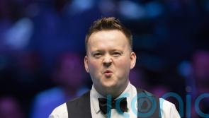 Shaun Murphy defies injury to knock Judd Trump out of UK Snooker Championship