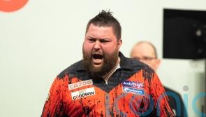 Michael Smith wins first major title after emphatic Grand Slam of Darts victory