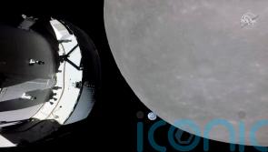 Nasa capsule in slingshot move around moon in last big step before lunar orbit
