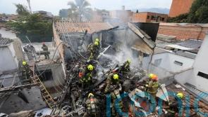 Eight dead after small plane crashes in Colombian neighbourhood
